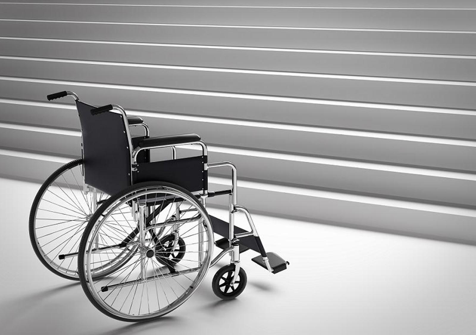 A wheelchair in front of a set of steps